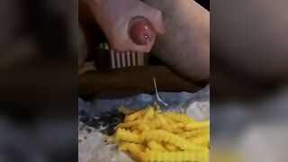 Slow-motion of a huge load on French fries