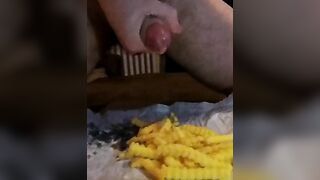 Slow-motion of a huge load on French fries