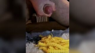 Slow-motion of a huge load on French fries