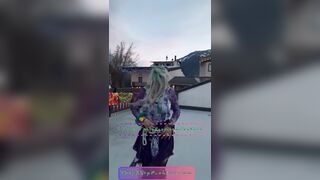Zaturn on a Washington Rooftop Showing off Split Tongue & Flashing