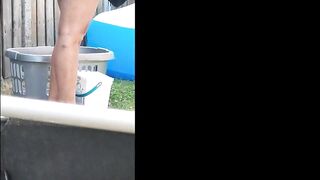 Wife no panties hanging laundry in the garden