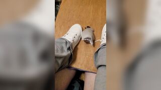 Rubbing his cock with white shoes