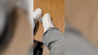 Rubbing his cock with white shoes