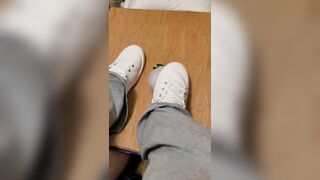 Rubbing his cock with white shoes