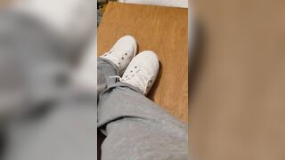 Rubbing his cock with white shoes