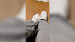 Rubbing his cock with white shoes