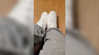 Rubbing his cock with white shoes