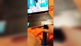 Watching lesbian porn while masturbating my wet pussy