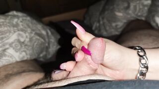 I jerk off his little dick with my long nails until he cums himself in the face