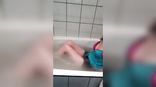 lie in the bathroom and play with your tits