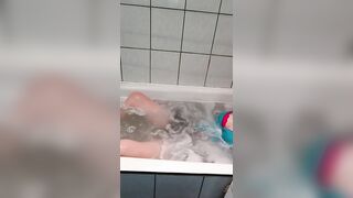lie in the bathroom and play with your tits