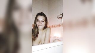 With a cigarette in the bathroom