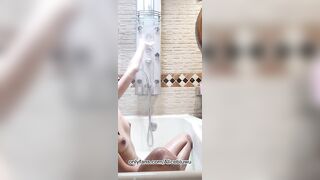 Cute latina naked in the bathtub