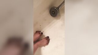 Washing my dirty smelly feet in the shower