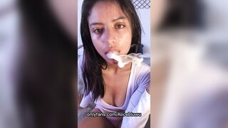 Cute brunette latina in sexy pink shorts