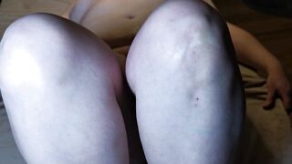 Emptying cum filled condoms on her pussy