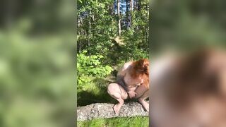 nudist girl pissing next to a shore