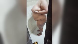 Indian wife taking shower and husband record