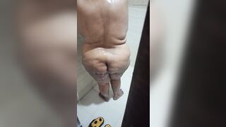 Indian wife taking shower and husband record