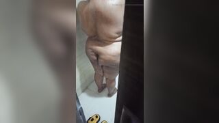Indian wife taking shower and husband record