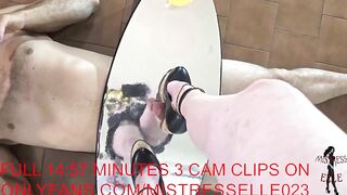 Mistress Elle in wedges flattens her slave's cock