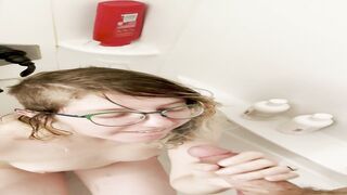 Goth slut gets golden shower and drinks piss