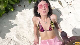 Katty pees powerfully on the beach and I give her golden shower on her face