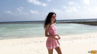 Katty pees powerfully on the beach and I give her golden shower on her face