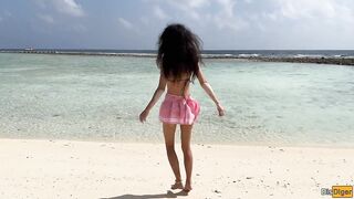 Katty pees powerfully on the beach and I give her golden shower on her face