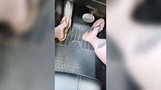 Driving around town with natural nails and flipflops enjoying summer