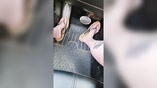 Driving around town with natural nails and flipflops enjoying summer