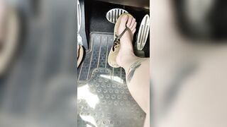 Driving around town with natural nails and flipflops enjoying summer