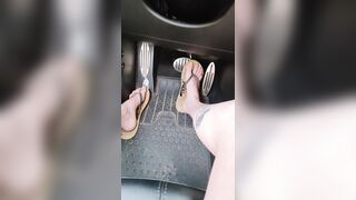 Driving around town with natural nails and flipflops enjoying summer