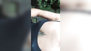 Sexy Latin girl in sunglasses sucking by crowded waterfall