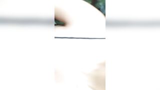 Sexy Latin girl in sunglasses sucking by crowded waterfall