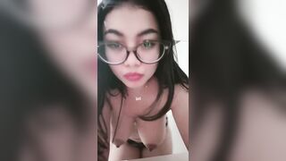 Beautiful college student striped in front of camera