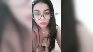Beautiful college student striped in front of camera