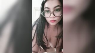 Beautiful college student striped in front of camera
