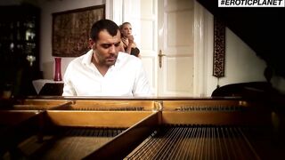 Hot brunette blows the pianist